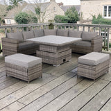Outdoor patio furniture set with gray cushions on a wooden deck.